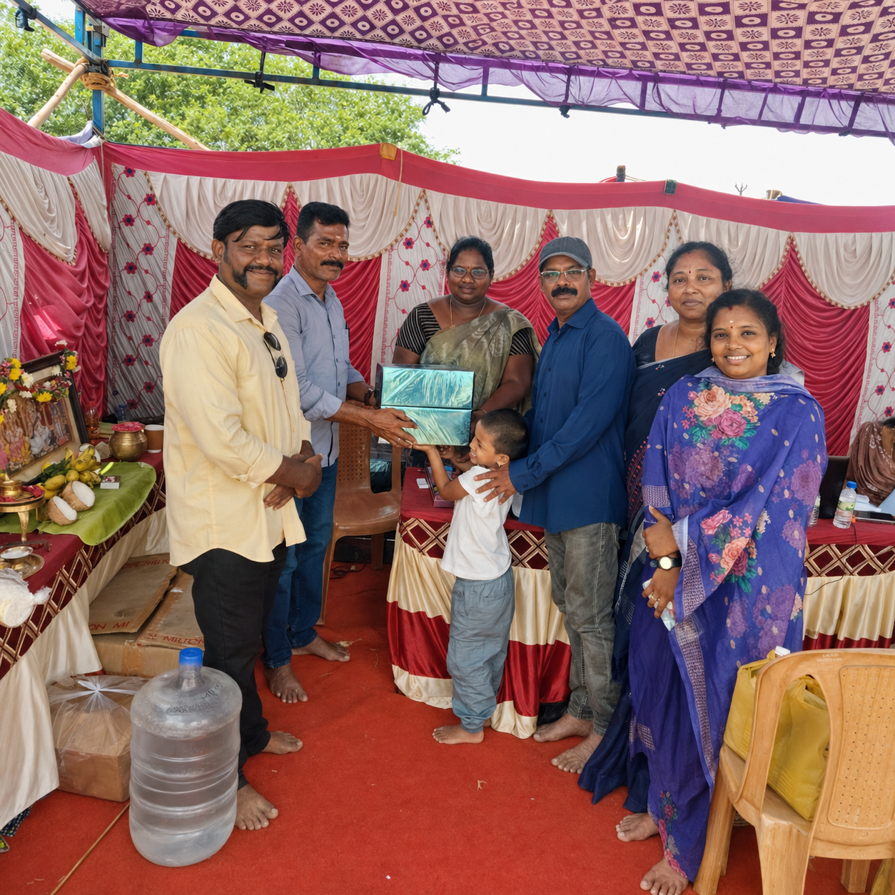 Happy customer celebrating their plot purchase at Dream Township with Ganesh Land Developers