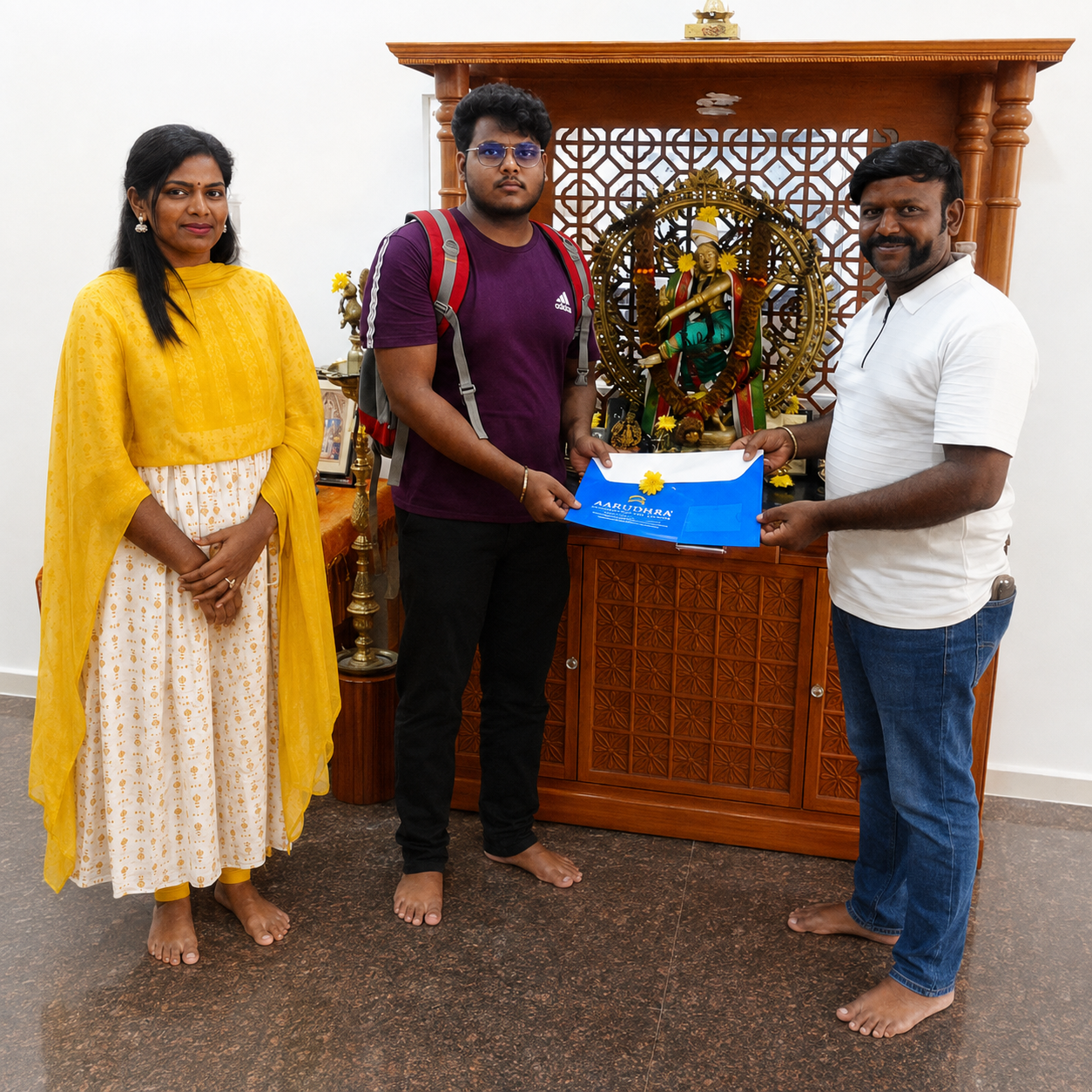 Happy customer celebrating their plot purchase at Rockfort Garden City with Ganesh Land Developers