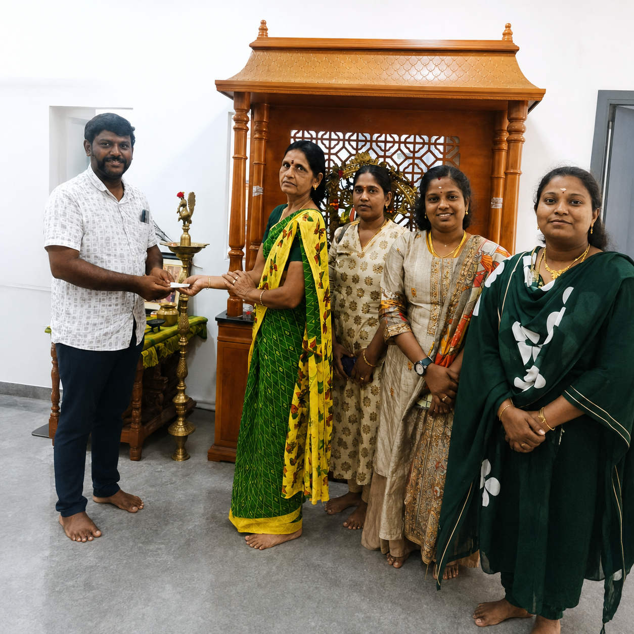 Happy customer celebrating their plot purchase at New Jai Nagar with Ganesh Land Developers