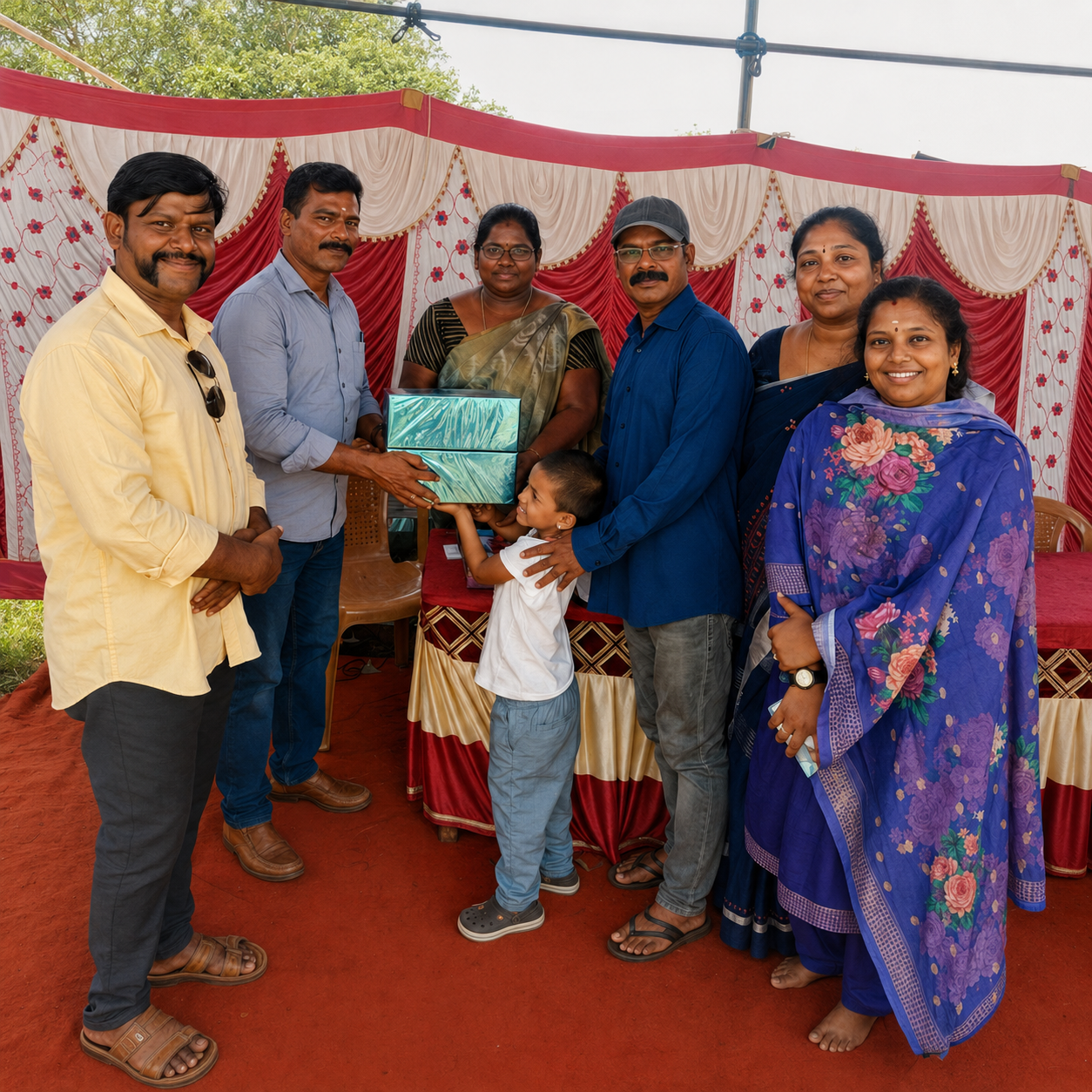 Happy customer celebrating their plot purchase at Satha Garden with Ganesh Land Developers